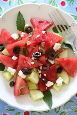 Chilled Watermelon Cucumber Feta Salad tossed with Kalamata olives, fresh mint and a drizzle of balsamic glaze – refreshing, light and delicious!