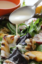 Grilled stone fruit like peaches and plums served over baby greens with walnuts and a sweet honey goat cheese dressing, this salad is light and delicious!