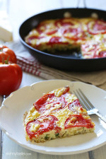 Garden tomatoes, summer zucchini, and Asiago cheese make a scrumptious frittata that highlights the end of summer's bounty.