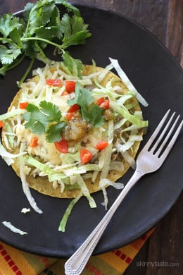 Once in a while, I crave something different for breakfast; something with a little flavor and spice to wake up my taste buds. And that's when Huevos Rancheros land on the menu in my home. But this time, rather than making them the traditional way, I had some tomatillo salsa lying around and I thought why not simmer the eggs in there.