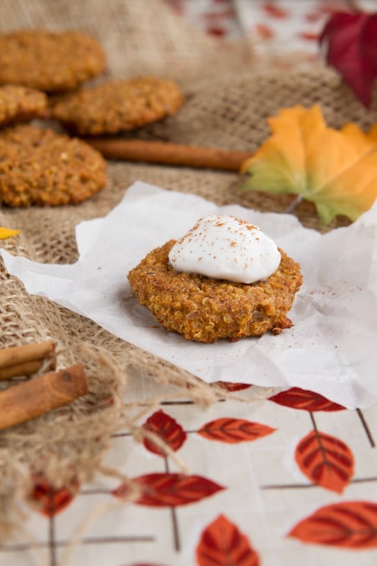 A pumpkin quinoa cookie on a piece of parchment paper