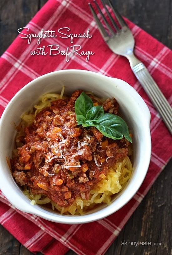 Spaghetti Squash with Meat Ragu is my go-to spaghetti squash meal! Roasted Spaghetti Squash topped with a simple-yet-delicious meat sauce simmered with tomatoes, onions, carrots and celery. It's so good, you won't miss the pasta!