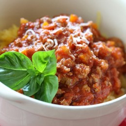 Spaghetti Squash with Meat Ragu is my go-to spaghetti squash meal! Roasted Spaghetti Squash topped with a simple-yet-delicious meat sauce simmered with tomatoes, onions, carrots and celery. It's so good, you won't miss the pasta!