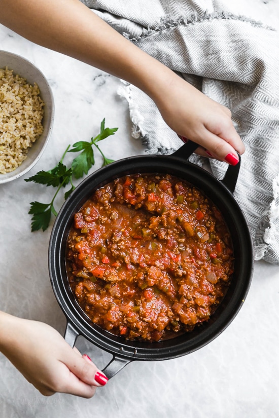 This easy stuffed pepper soup has bell peppers, ground beef, tomatoes, and rice in a hearty bowl of soup. Stovetop and Instant Pot options! Pot of hearty stuffed pepper soup
