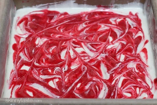 Cranberry Swirl Cheesecake Squares with a gingersnap pecan crust – so good, less guilt and perfect for the Holidays!