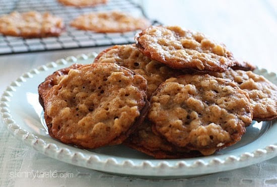 These delicious dark chocolate oatmeal lace cookies are light, crisp and chewy, sandwiched together with melted dark chocolate.