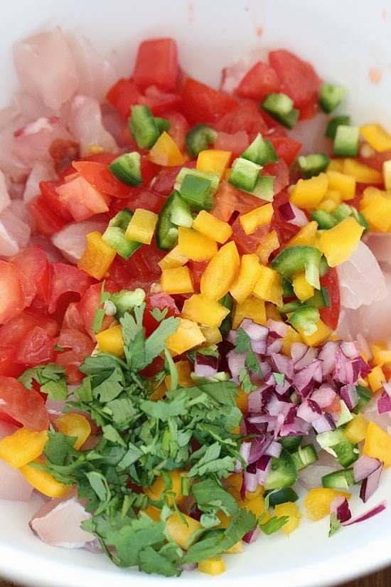 These Ceviche Cucumber Cups are made with fresh raw fish (shellfish), lime juice, onions and cilantro, making it gluten-free, paleo friendly and low-carb!