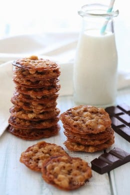These delicious dark chocolate oatmeal lace cookies are light, crisp and chewy, sandwiched together with melted dark chocolate.