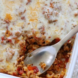 This super easy macaroni casserole is a baked pasta dish with ground turkey, veggies, marinara sauce and cheese. Kid-friendly and no need to pre-cook the pasta!