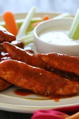 Quick and easy – these buffalo chicken strips are spicy and delicious! I like to serve them with my homemade skinny blue cheese dressing and celery sticks on the side for a hot and spicy appetizer.