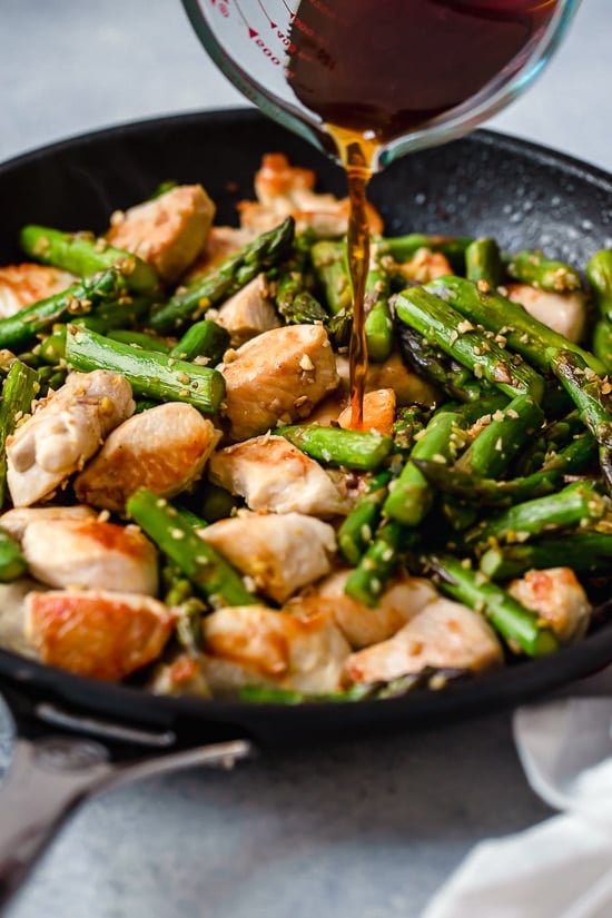 This quick weeknight Chicken and Asparagus Lemon Stir Fry is perfect for spring, made with lean chicken breast, asparagus, fresh lemon, garlic and ginger.