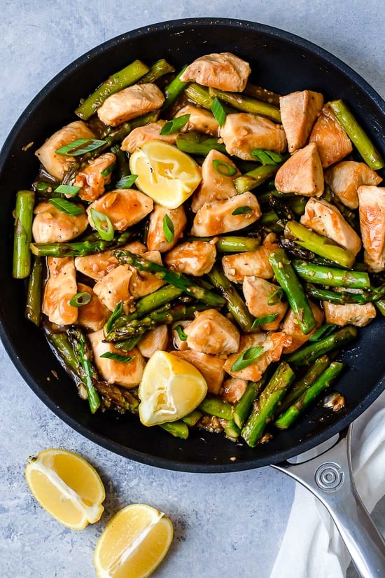This quick weeknight Chicken and Asparagus Lemon Stir Fry is perfect for spring, made with lean chicken breast, asparagus, fresh lemon, garlic and ginger.