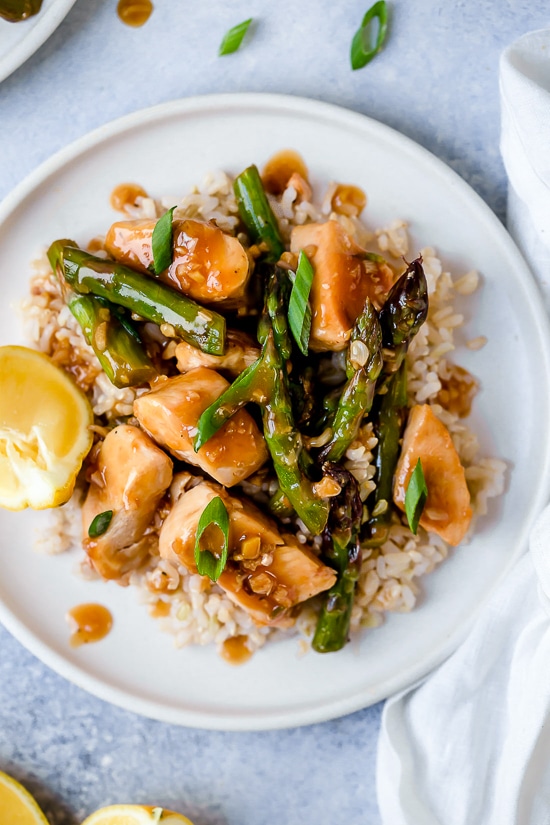 This quick weeknight Chicken and Asparagus Lemon Stir Fry is perfect for spring, made with lean chicken breast, asparagus, fresh lemon, garlic and ginger.