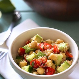 Quinoa chickpea and avocado salad with cucumbers, tomatoes, red onion, lime juice and cilantro – a flavorful vegetarian salad loaded with protein, fiber and healthy fats.