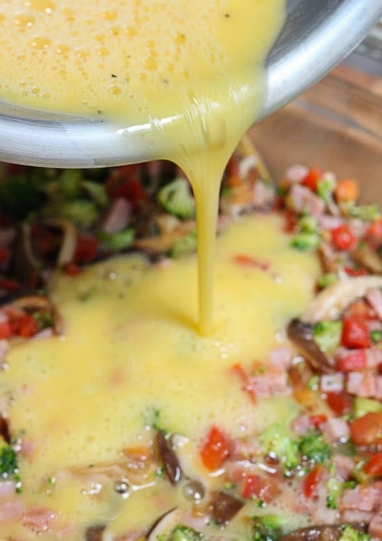 Make this delicious and easy breakfast veggie ham and cheese egg bake for brunch or make it ahead for meal prep for the week.