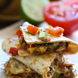 I make Crock Pot Picadillo all the time in my house (Madison's number one request), and because it makes so much I like to get creative with my leftovers. I came up with this quesadilla for lunch one day and my husband said I should put it on the blog, so I thought with Cinco De Mayo coming, it would be fun to do some Cuban-Mexi fusion.