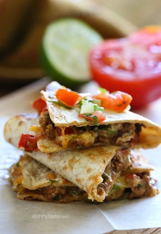 I make Crock Pot Picadillo all the time in my house (Madison's number one request), and because it makes so much I like to get creative with my leftovers. I came up with this quesadilla for lunch one day and my husband said I should put it on the blog, so I thought with Cinco De Mayo coming, it would be fun to do some Cuban-Mexi fusion.