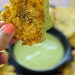 These Baked Tostones or twice "Fried" Plantains aren't fried at all, they are baked in the oven which makes them a delicious, healthy side dish or appetizer!