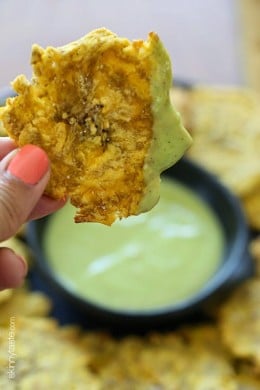 These Baked Tostones or twice "Fried" Plantains aren't fried at all, they are baked in the oven which makes them a delicious, healthy side dish or appetizer!
