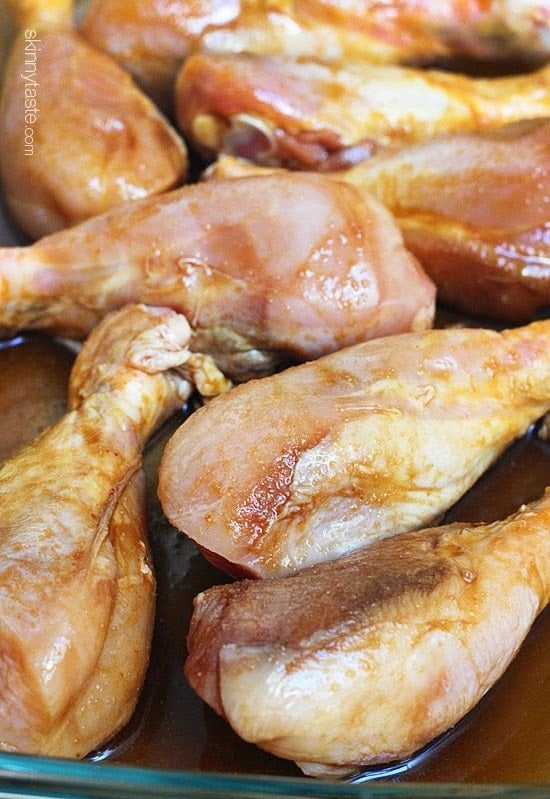 These sweet 'n spicy Asian glazed grilled drumsticks are finger licking good! An inexpensive, weeknight dish you'll want to make all summer long!