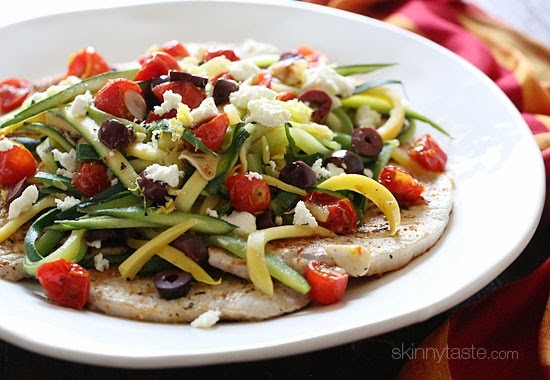 Talk about a delicious weeknight summer meal! These thin and lean thin pork chops are pan seared and served topped with julienned summer squash, roasted tomatoes, lemon juice, olives and Feta cheese. So much flavor and color in this dish!