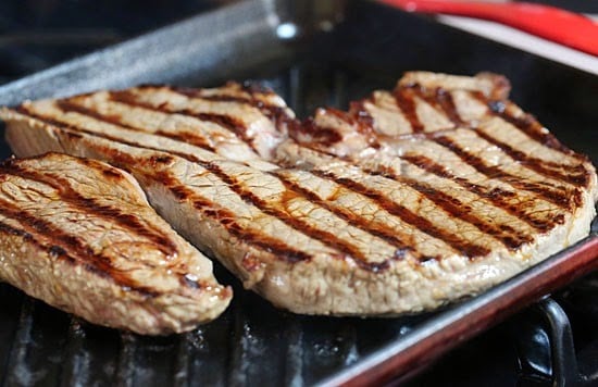 Grilled steak, arugula and pasta salad is topped with sweet balsamic caramelized onions and fresh shaved Parmesan. I'm a sucker for a good steak salad, and this one is AWESOME!