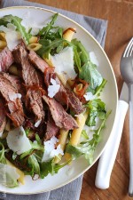 Grilled steak, arugula and pasta salad is topped with sweet balsamic caramelized onions and fresh shaved Parmesan. I'm a sucker for a good steak salad, and this one is AWESOME!