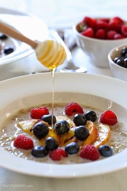 These Summer Quinoa Breakfast Bowls are my favorite! Served as a warm cereal topped with fresh fruit and a drizzle of honey. A healthy protein packed breakfast.