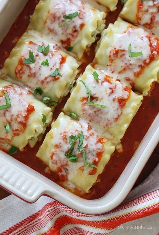 lasagna rolls topped with basil