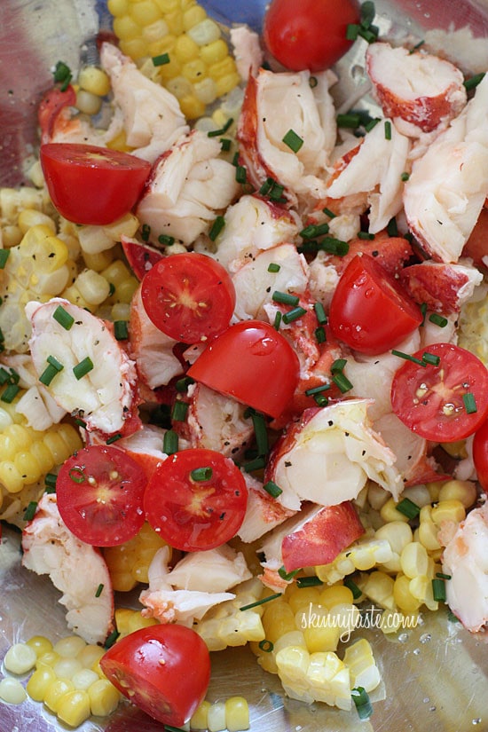 Chilled Lobster Salad with Sweet Summer Corn and Tomatoes, the perfect light summer salad made with sweet summer corn, grape tomatoes, garden herbs and chilled steamed lobster.