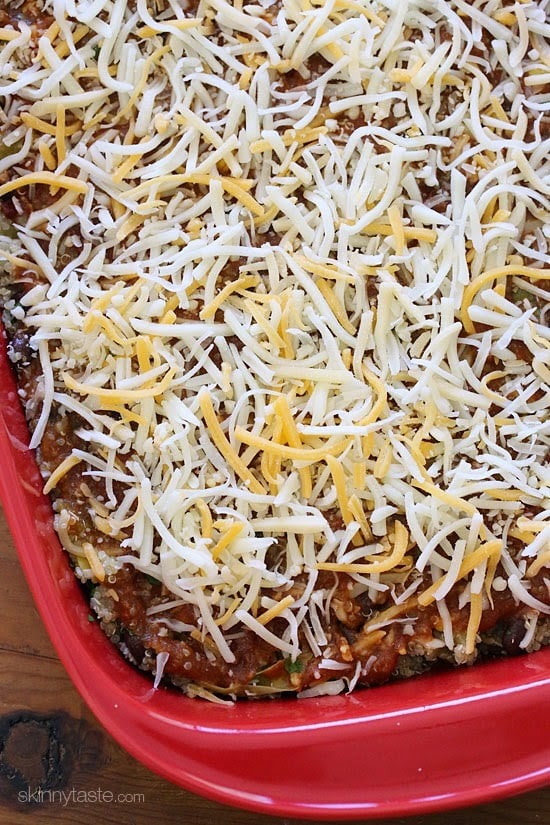 Quinoa Fiesta Enchilada Bake made with quinoa, black beans, corn, cilantro and green chiles topped with a quick homemade enchilada sauce and cheesy goodness!