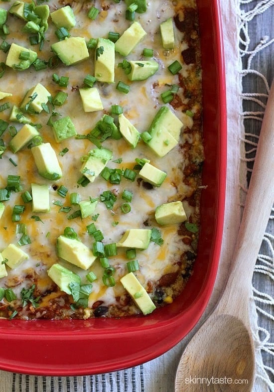 Quinoa Fiesta Enchilada Bake made with quinoa, black beans, corn, cilantro and green chiles topped with a quick homemade enchilada sauce and cheesy goodness!