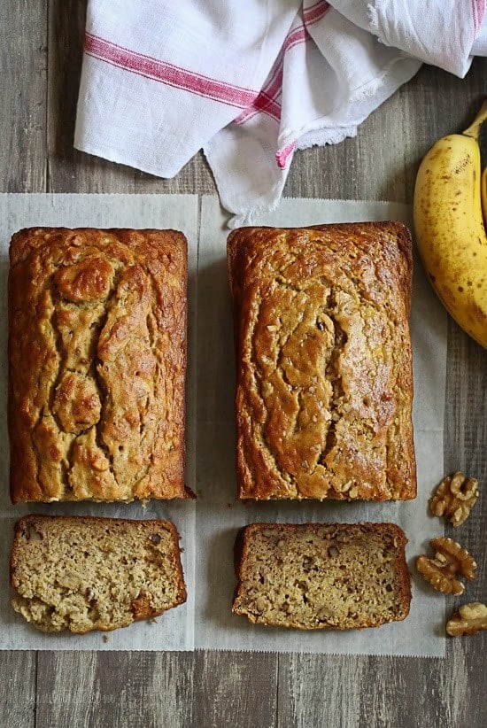Delicious, low-fat, gluten-free banana nut bread made two-ways! So moist and delicious, you can't tell it's light. My family went bananas for this!!