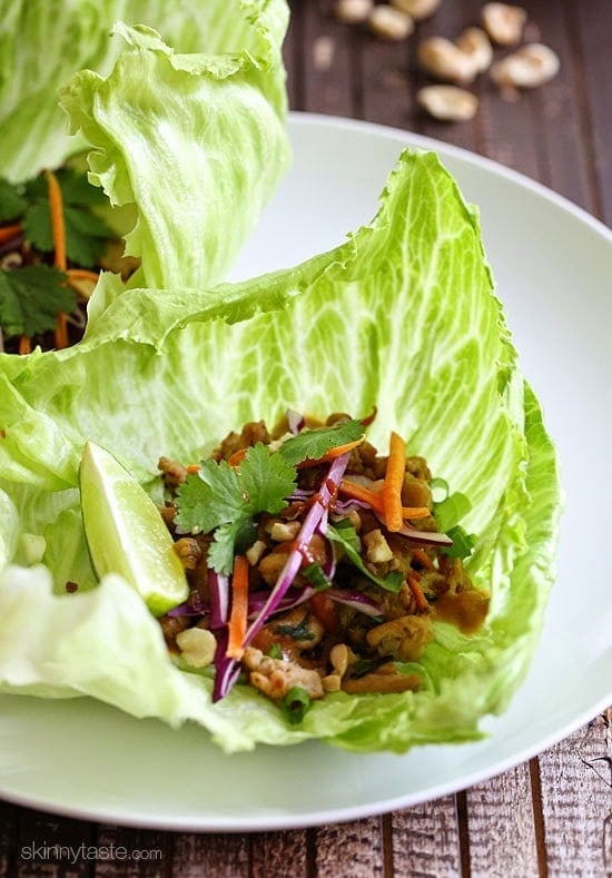 Not your ordinary tacos – these Thai chicken lettuce tacos are spicy and exotic, made with my light peanut sauce which I make with PB2 (powdered peanut butter) sriracha, ginger and spices. To balance out the spice, I chose to serve these in crisp cool lettuce wraps but tortillas would work great too!