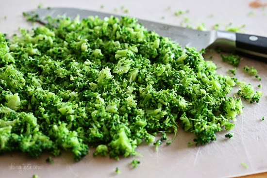 Chopped broccoli on a cutting board