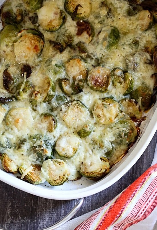 Brussels Sprouts Gratin are roasted until crisp, then topped with a light cheese sauce made with Gruyere and Parmesan, and baked until brown and bubbling – the perfect Holiday dish!