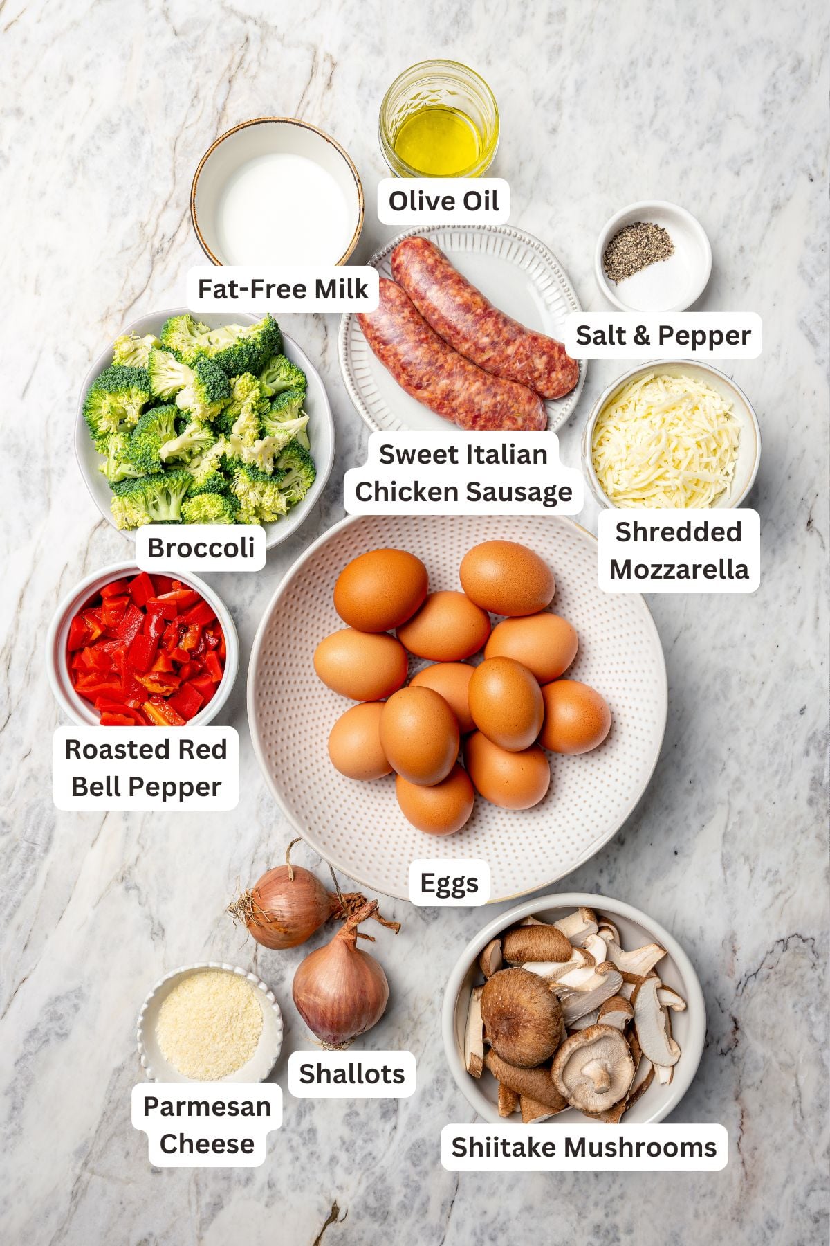 Ingredients for breakfast casserole with sausage, cheese and veggies.