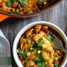 One Pot Cheesy Turkey Taco Chili Mac recipe is so easy and protein packed! Made with taco seasoning, beans, and pasta shells topped with cheese is a favorite in my home! Bonus points for dirtying only one pot!