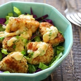 Bangin Good Chicken Salad is delicious, made with tender chunks of breaded chicken baked until golden topped with delicious Bang Bang sauce. I served this over mixed greens and swooned with every bite!