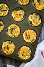 These petite crustless quiches are SO good, loaded with turkey kielbasa, veggies and cheese. A perfect make-ahead breakfast for meal prep and naturally gluten free!