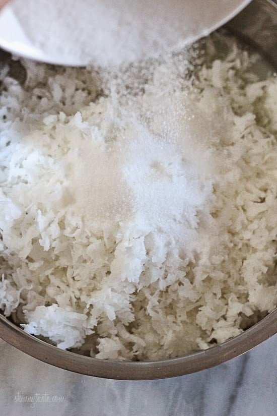 Easy gluten free coconut macaroons shaped like a bird's nest, filled with mini chocolate Cadbury eggs – a tasty Easter treat!