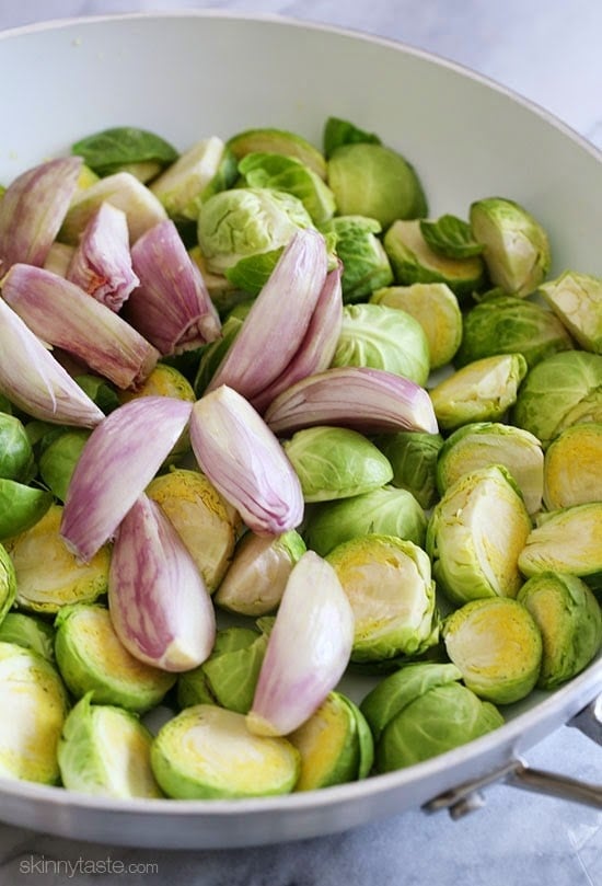 These pan roasted brussels sprouts and shallots are perfectly charred, and finished with a sweet balsamic glaze.