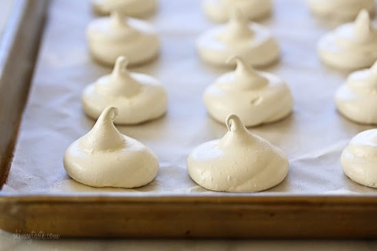 Melt-in-your-mouth meringues dipped in creamy white chocolate and sprinkles, is there anything sweeter?