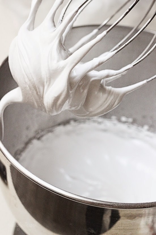 Melt-in-your-mouth meringues dipped in creamy white chocolate and sprinkles, is there anything sweeter?