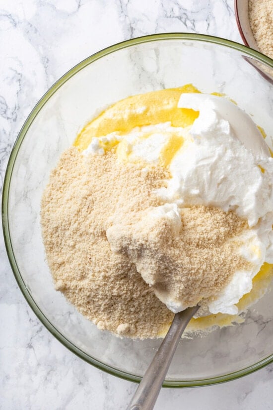 This easy almond cake recipe is made with just 5 ingredients but don't let its simplicity fool you—it's light, airy, and so delicious! Egg whites and almond flour added to wet ingredients for almond cake