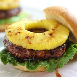 This easy Hawaiian teriyaki burger is made with lean ground beef, carrots, scallions and topped with grilled pineapple and a homemade pineapple teriyaki sauce.