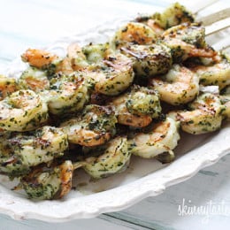 These easy Grilled Pesto Shrimp Skewers are made with homemade basil pesto, you'll want to make them all summer long!