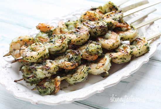 These easy Grilled Pesto Shrimp Skewers are made with homemade basil pesto, you'll want to make them all summer long!