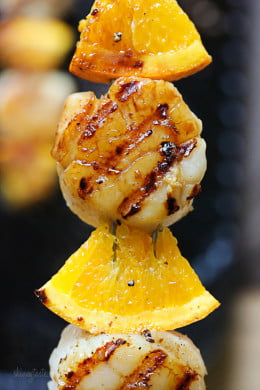 These grilled scallops are FANTASTIC and really simple to make. Once prepped, they take less than 6 minutes to cook. They can be served as an appetizer for four, or as a main dish for two.