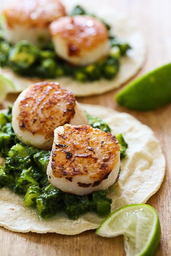 Green Scallop Tacos with a spicy green herb cucumber and avocado salsa and a squeeze of lime juice on top, so good!